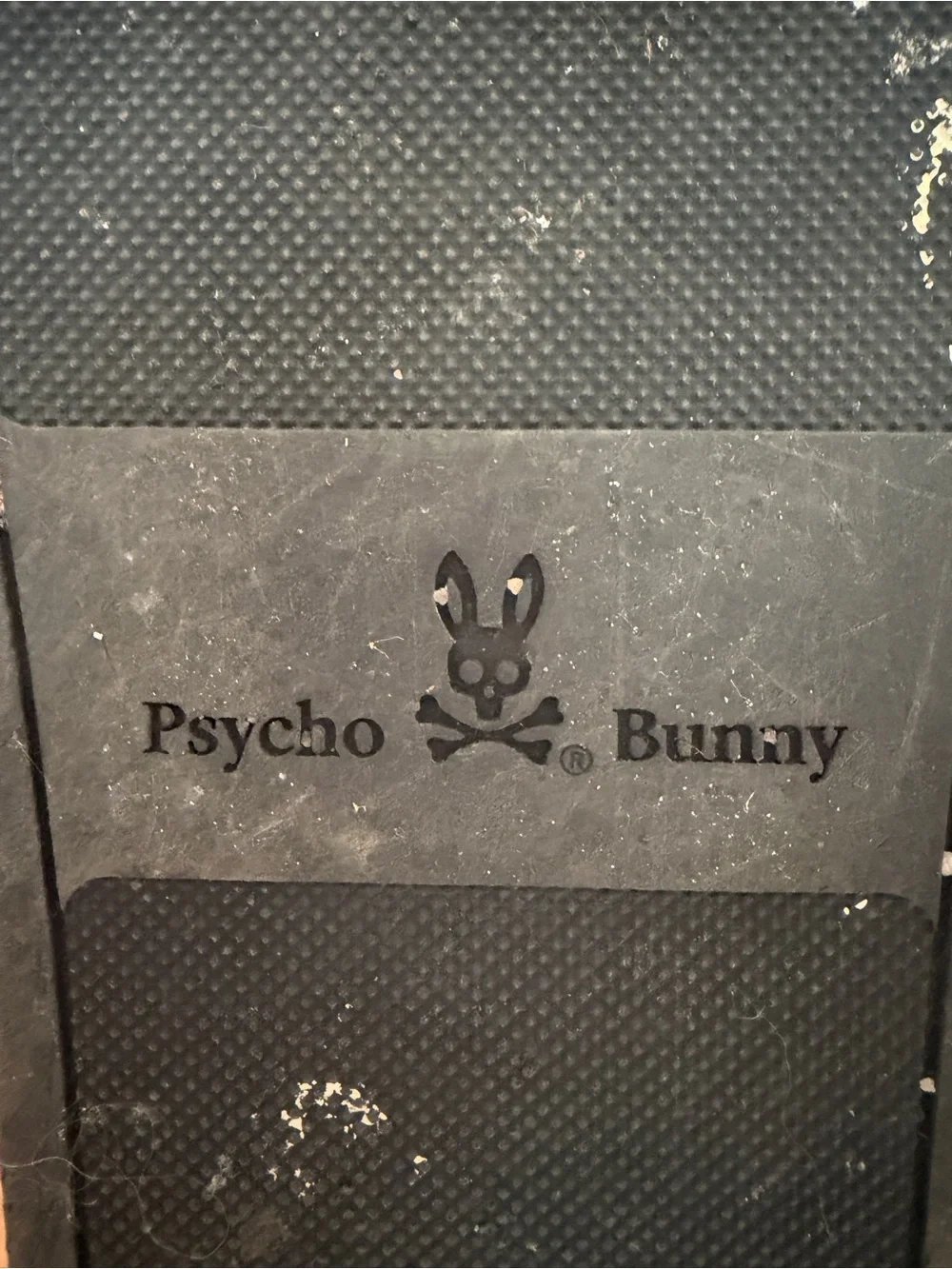 Psycho Bunny Black Slides with Cream Skull-and-Crossbones Logo